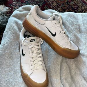 Ladies Nike sneakers, size 10 1/2 worn once. 
EXCELLENT CONDITION